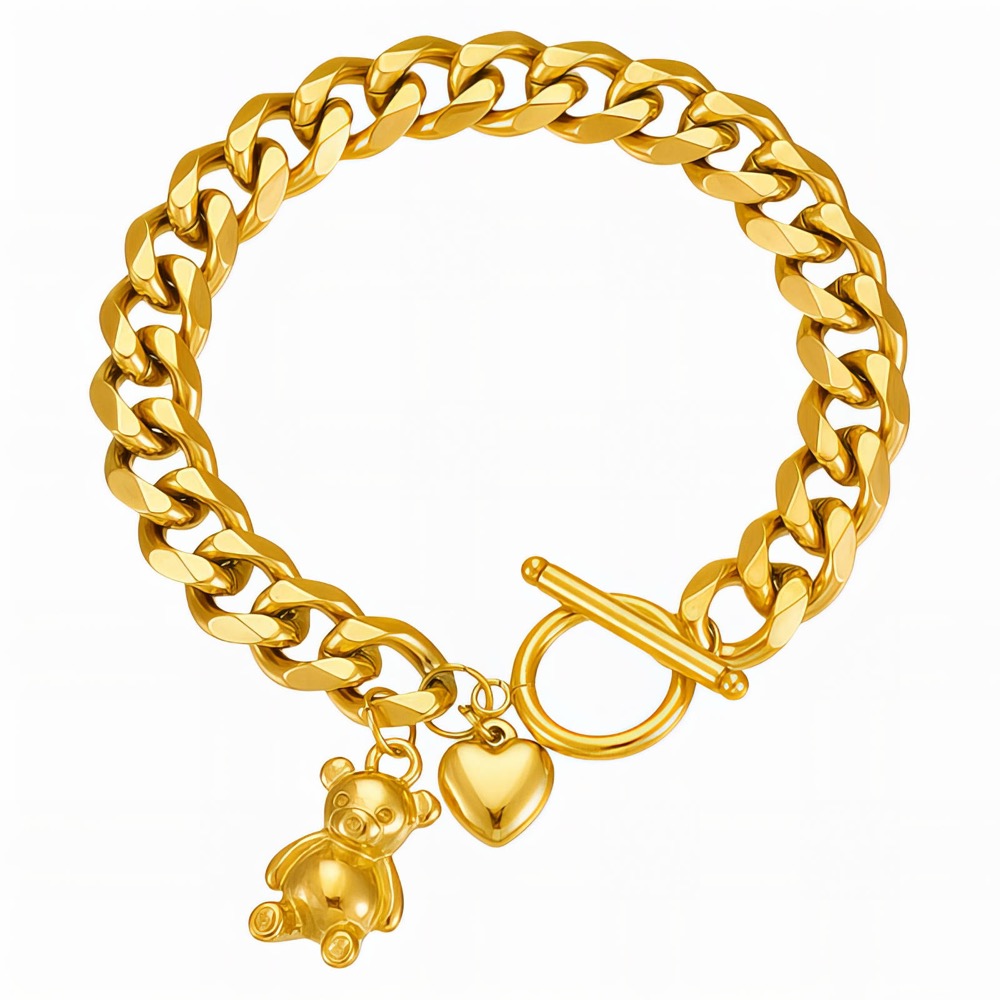 Kräftiges goldfarbenes Panzerarmband mit Herz- und Bärchenanhänger